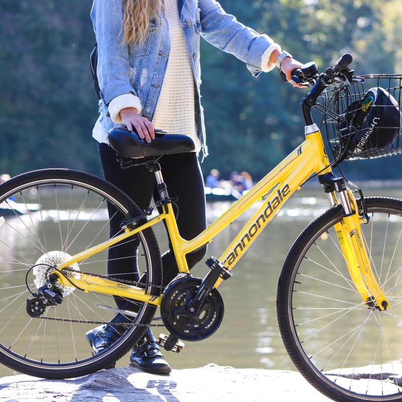 a person holding a bicycle