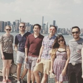 a group of people posing for the camera